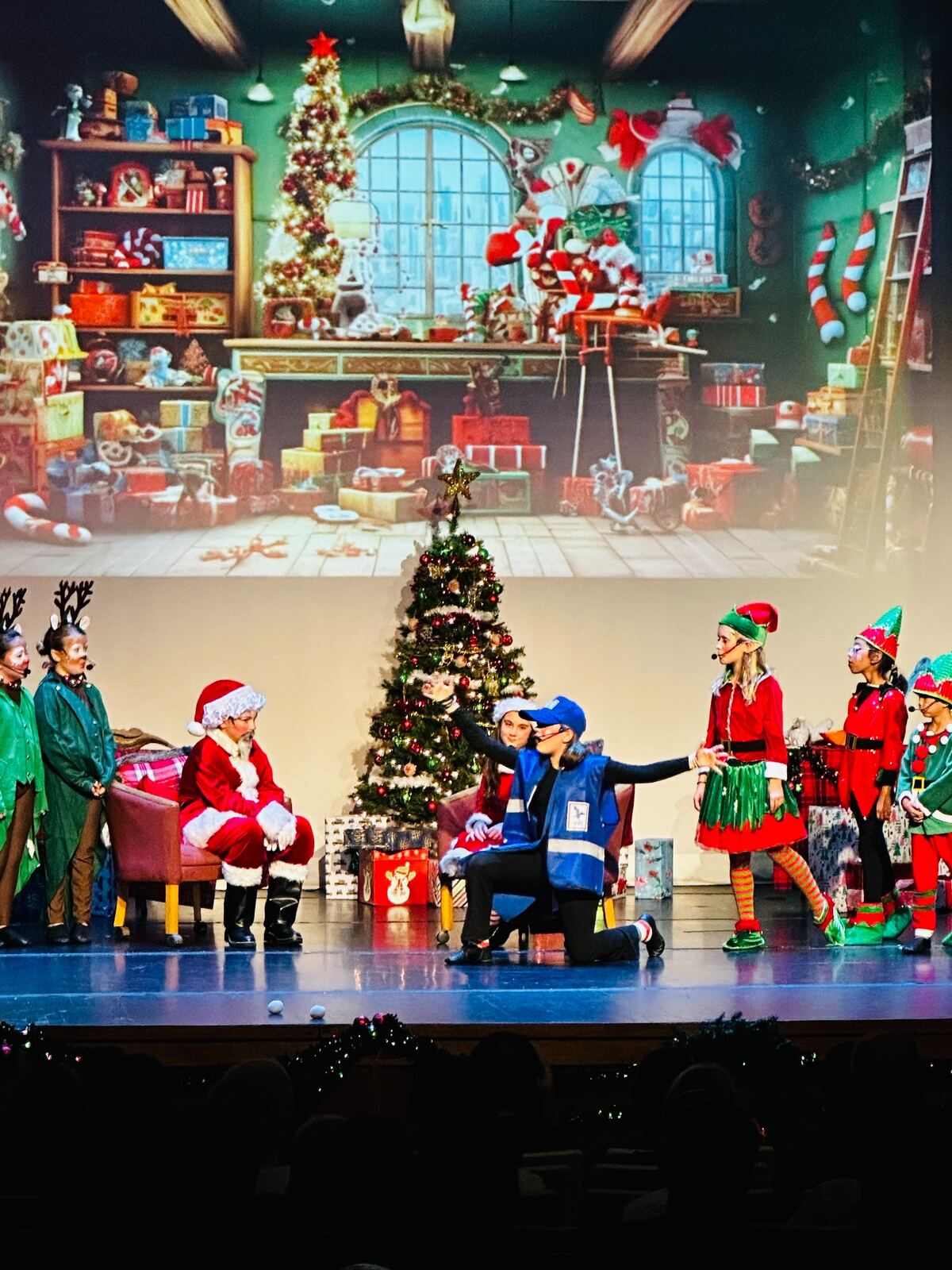 Young performers onstage in MTE's 2024 Christmas musical Broadway Santa