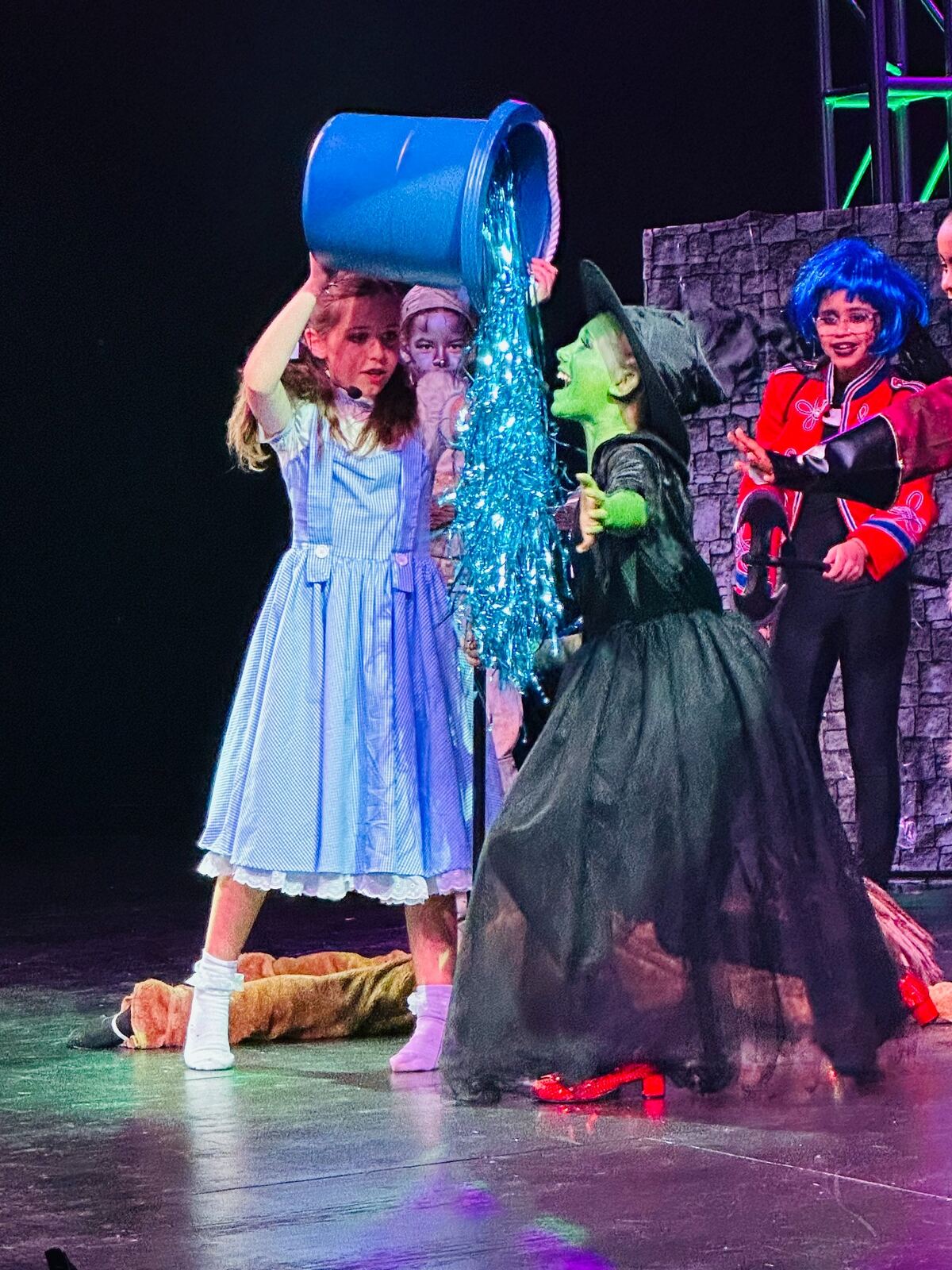 Young performers onstage in MTE's 2023 production of Wizard of Oz